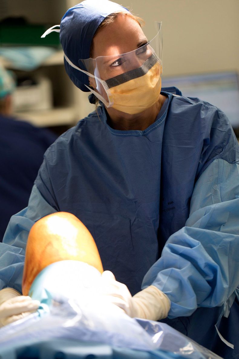 Dr KInzel in an operating room