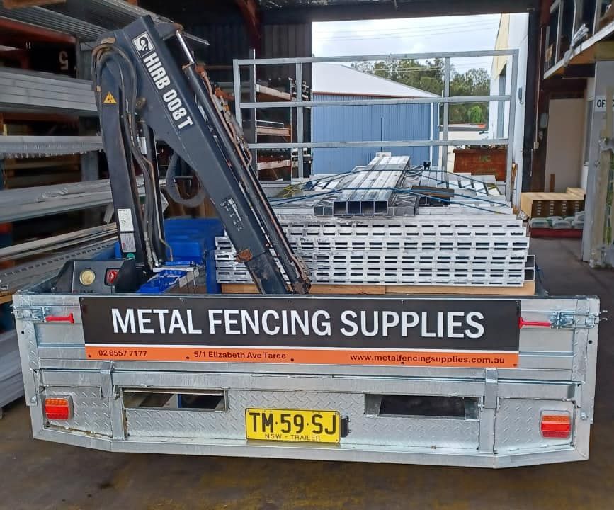 Metal Fencing Supplies Truck Loaded With Metal, With a Crane Attached — Metal Fencing Supplies In Harrington, NSW