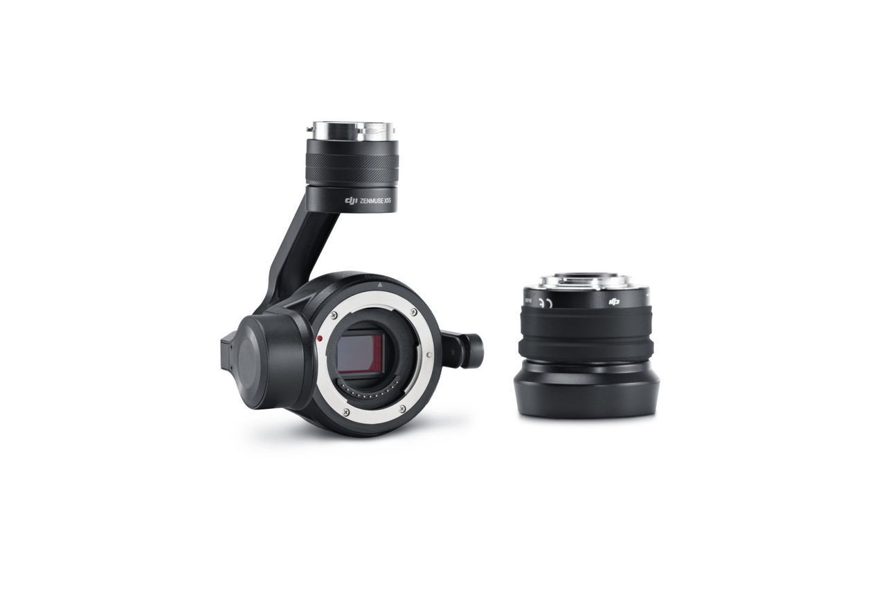 Camera with a lens attached, displayed on a white background.