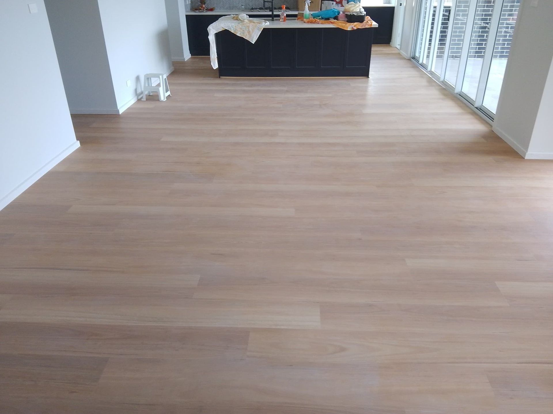 Light Wood Flooring Spans an Open Space — BLB Flooring Solutions in Newcastle, NSW