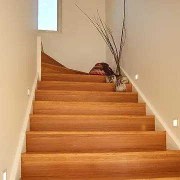 Wooden Floor Planks in Shades of Brown and Tan, Varying in Grain Patterns — BLB Flooring Solutions in Central Coast, NSW