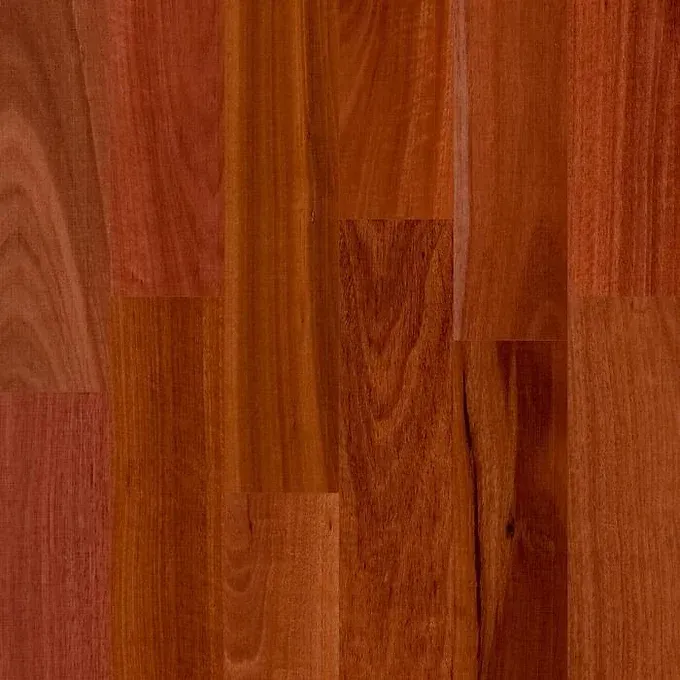 Wooden Floor With Red and Brown Tones, Showing Wood Grain Patterns — BLB Flooring Solutions in Central Coast, NSW