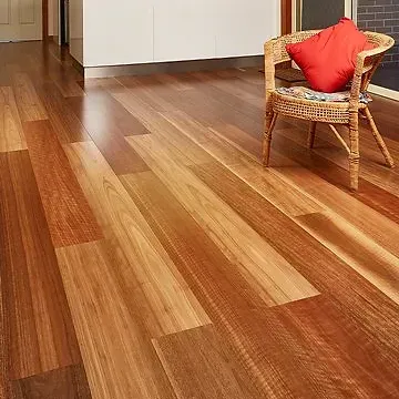 Close-Up of Reddish-brown Hardwood Flooring With Visible Grain and Knots — BLB Flooring Solutions in Central Coast, NSW