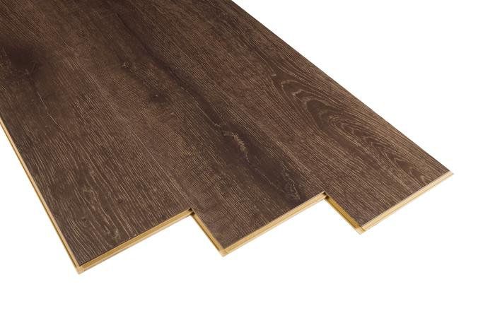 A Close Up of a Dark Brown Wooden Floor — BLB Flooring Solutions in Central Coast, NSW