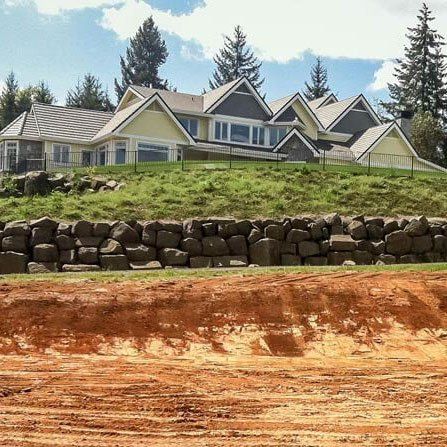 Excavation Site Below the House — Eugene, OR — Braun Excavating Inc.
