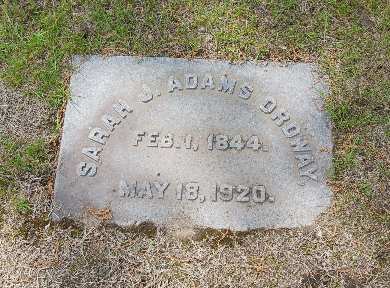 Stained granite footstone