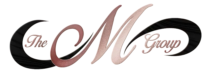 The M Group logo in black and pink script on a white background
