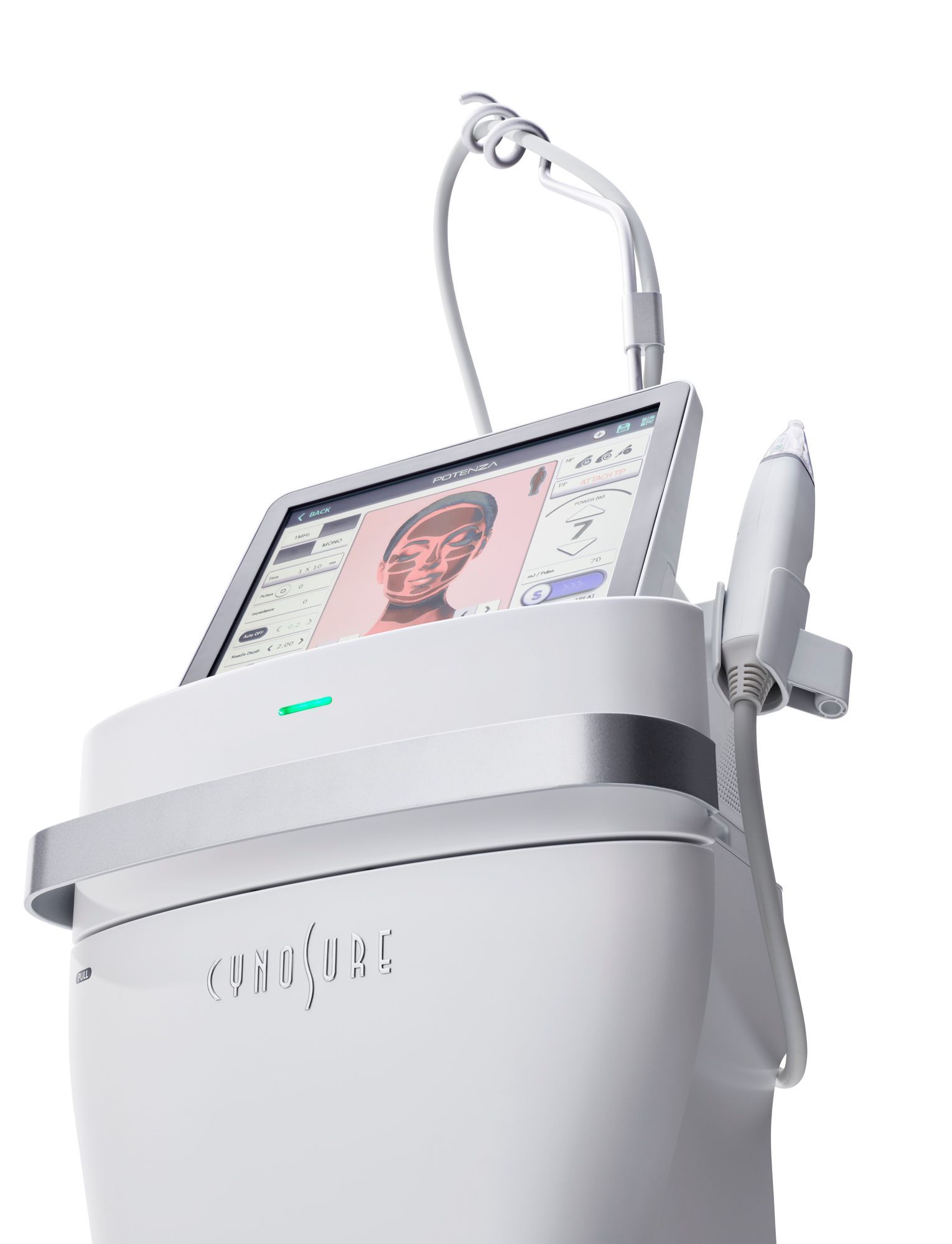 A white machine with a tablet on top of it.