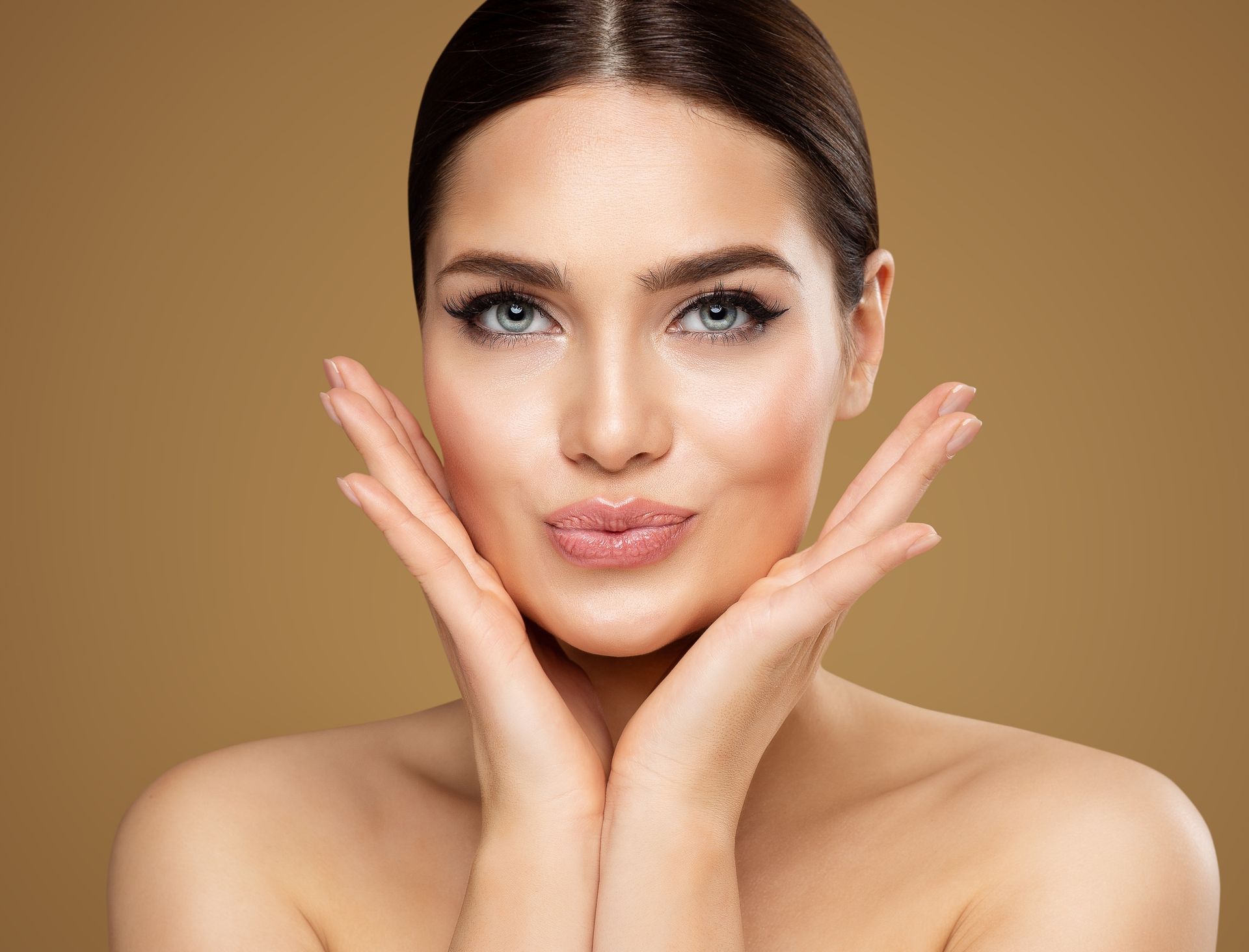 a woman touching her face