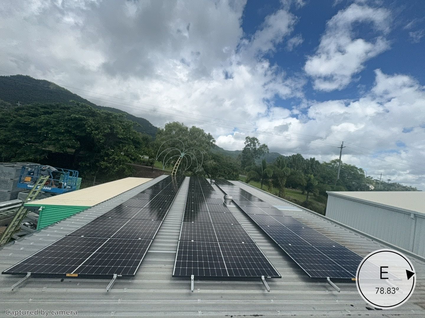 A Commercial Building With Solar Panels On The Roof — Solar Power Whitsunday In Cannonvale, QLD