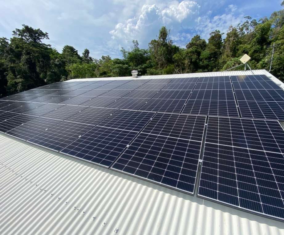 A Large Solar Panel Is Sitting On Top Of A Building — Solar Power Whitsunday In Whitsundays, QLD