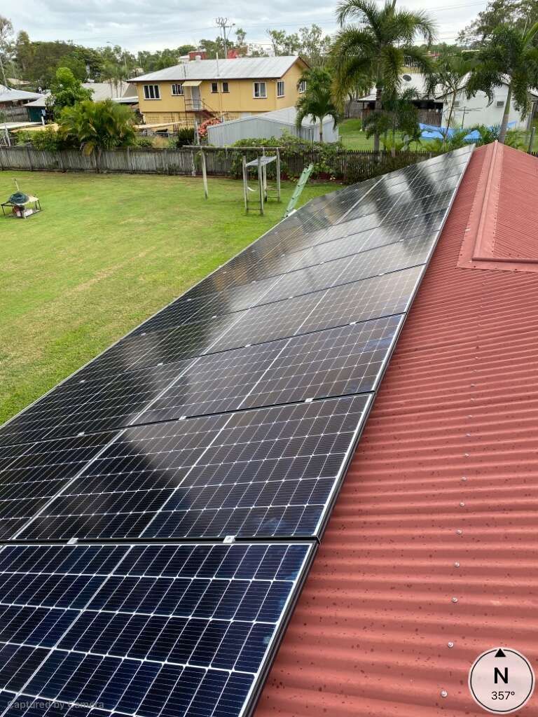 A Row Of Solar Panels On Top Of A Red Roof — Solar Power Whitsunday In Whitsundays, QLD