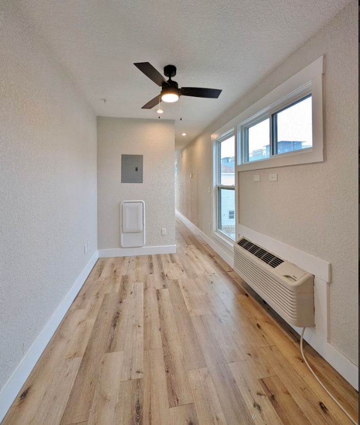 Ashley Lofts living room with hardwood floors and modern finishes
