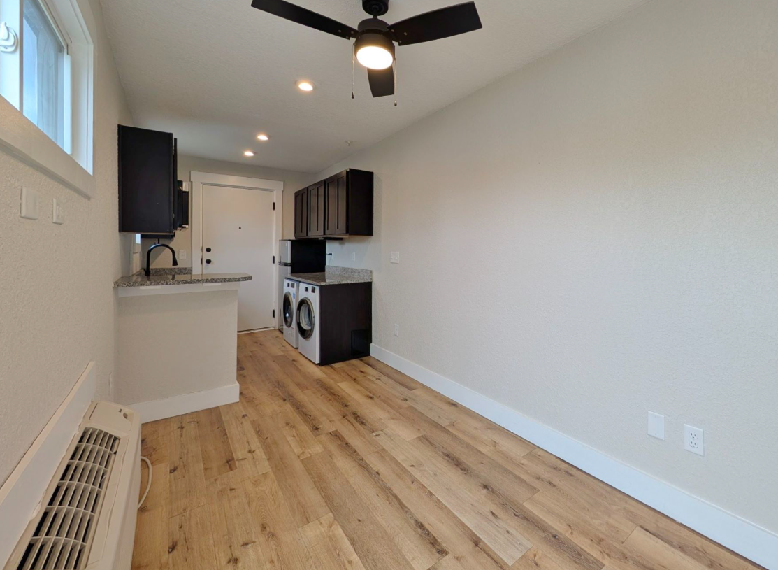 Ashley Lofts living room with hardwood floors and modern finishes