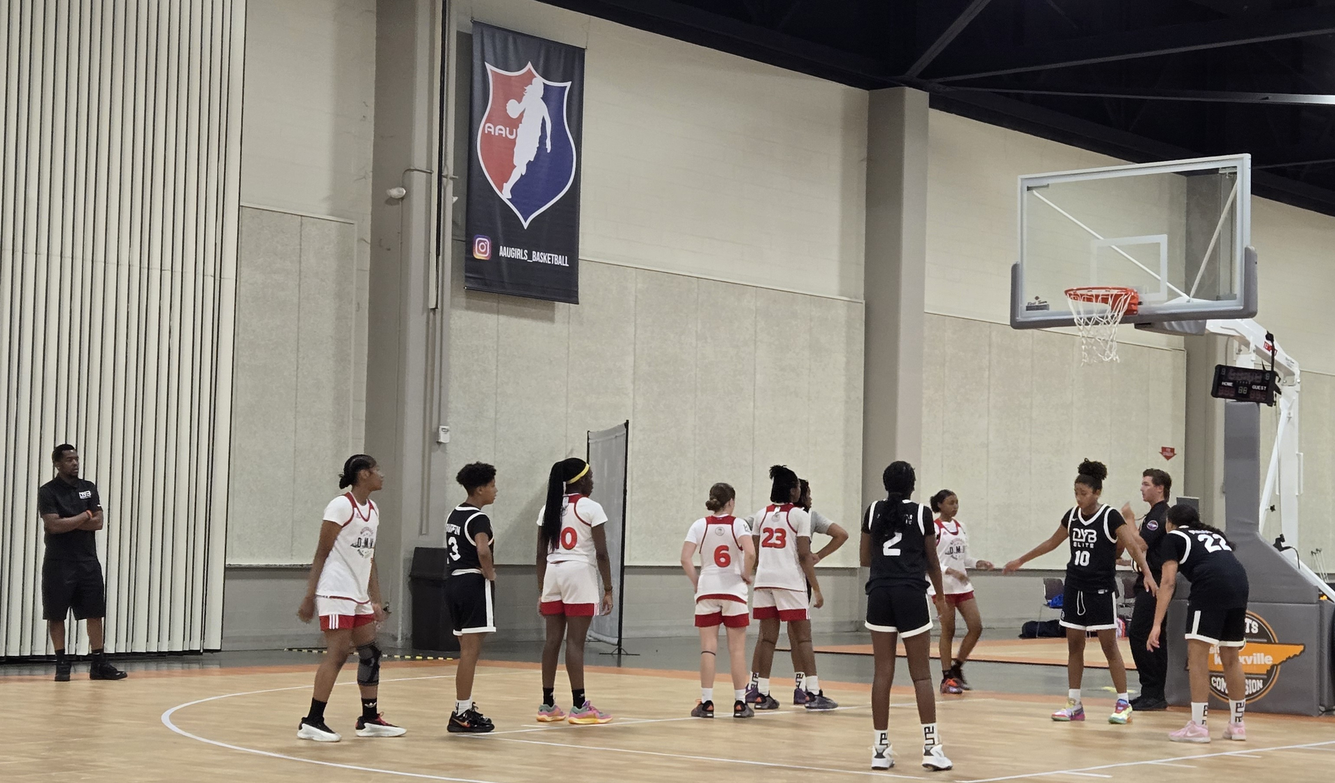 A female basketball player with the number 4 on her jersey