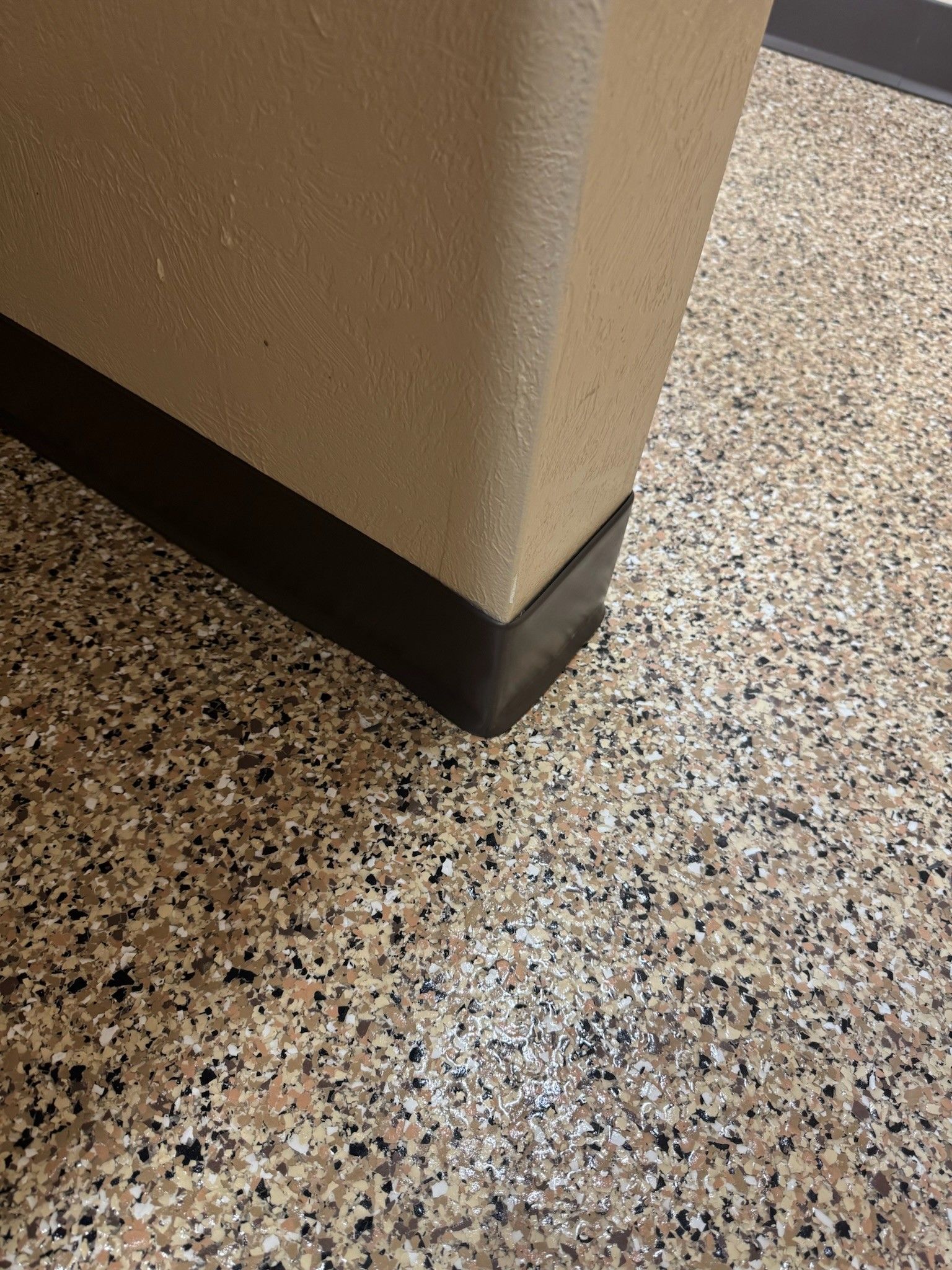 Vinyl cove base installed at the wall-to-floor transition by 814 Epoxy and More