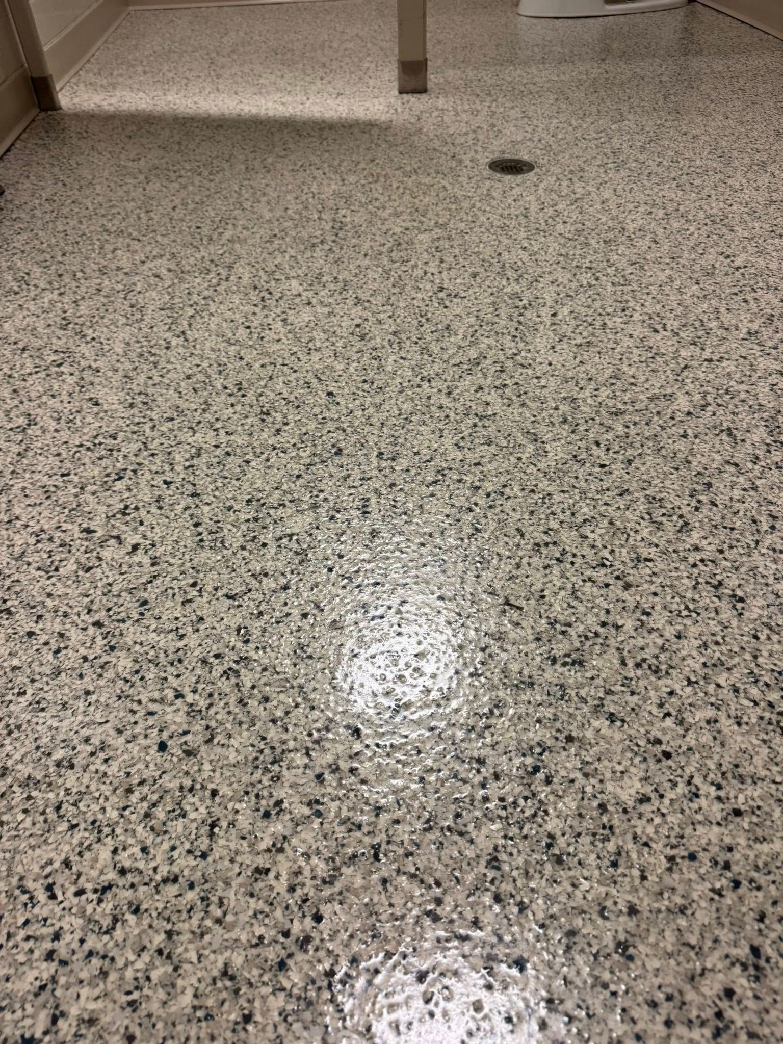 Completed flake epoxy floor project by 814 Epoxy and More in Erie, PA