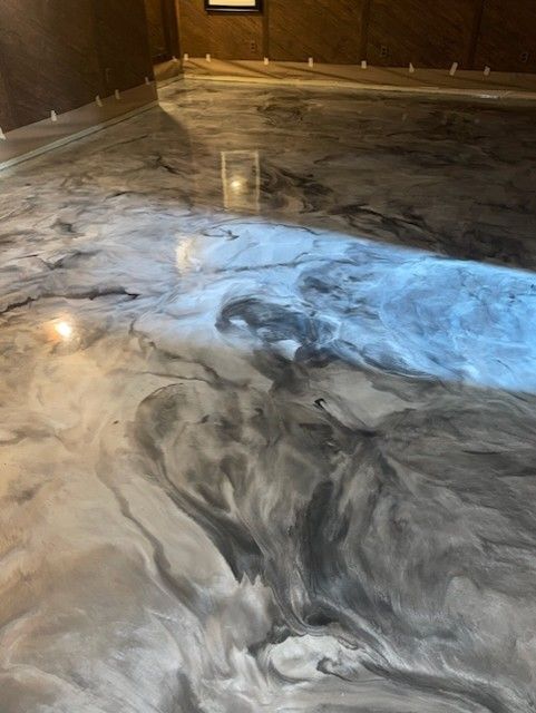 Black and grey marble metallic epoxy floor by 814 Epoxy Erie PA