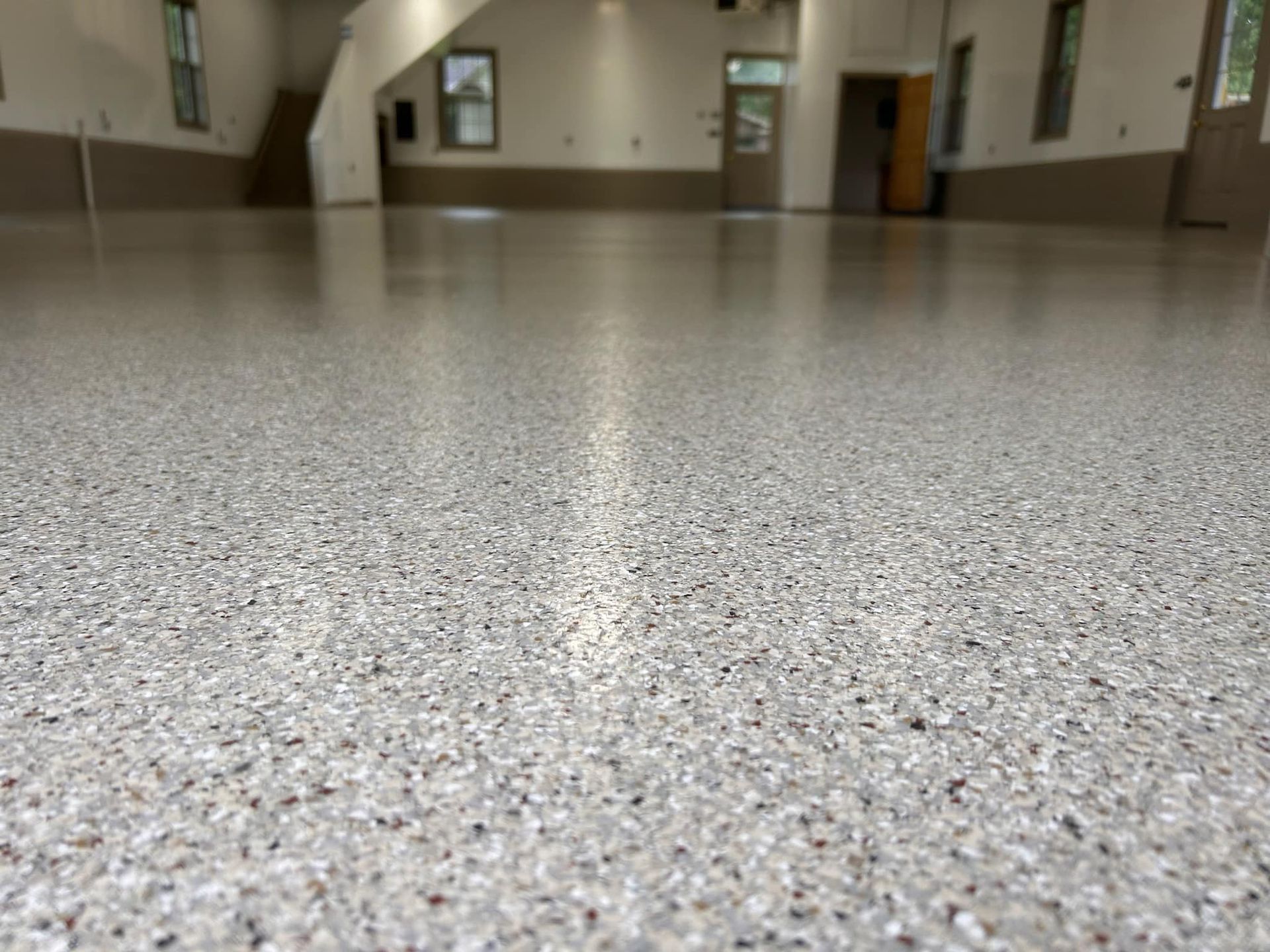 Creekbed flake epoxy garage floor in Erie, PA