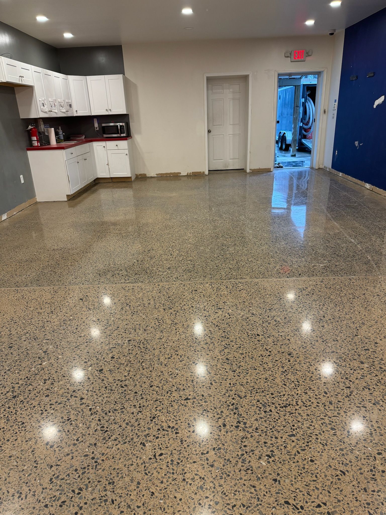 Large commercial blue metallic epoxy floor installation Erie PA 814 Epoxy