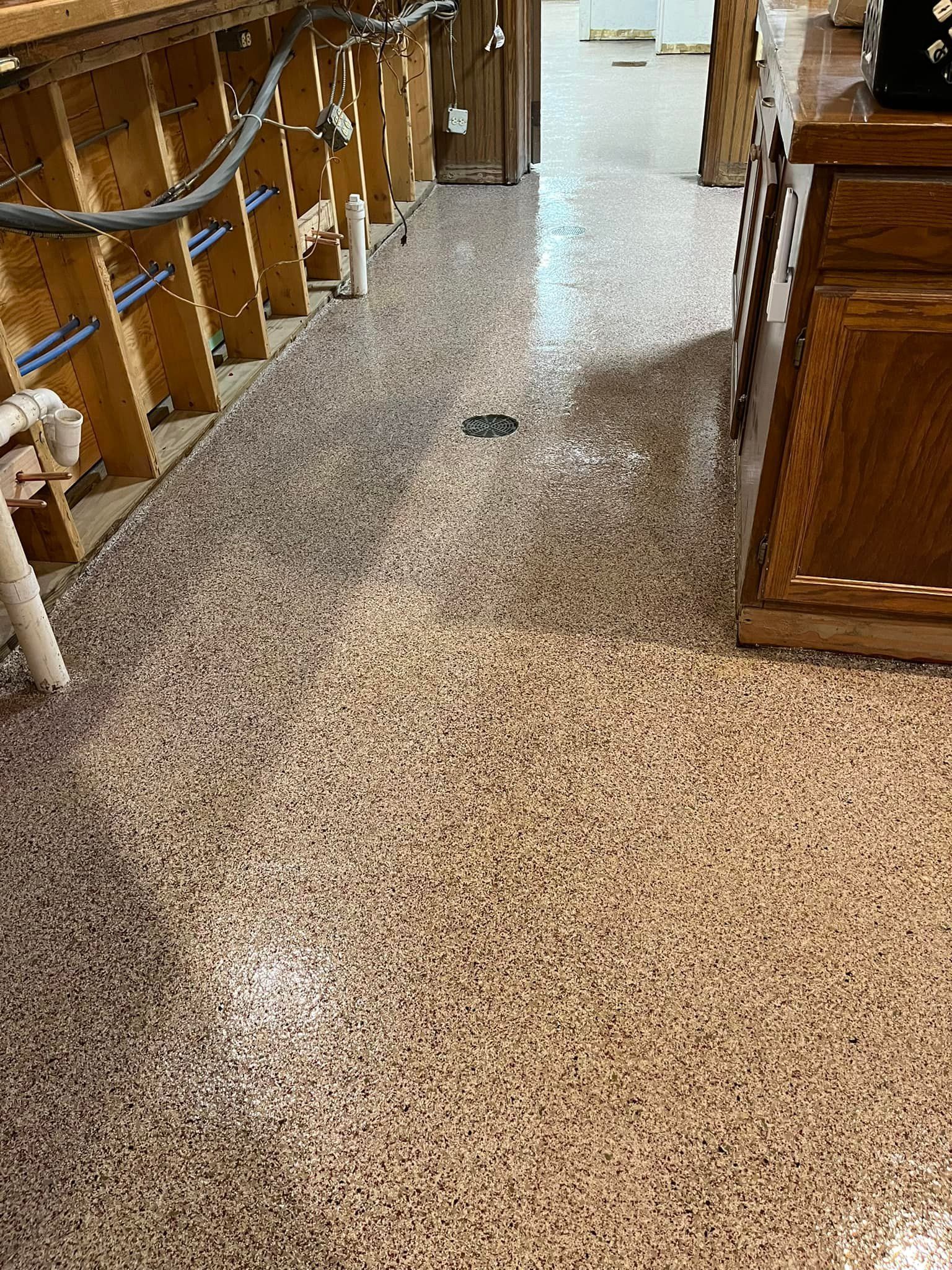 Firehall flake floor by 814 Epoxy and More in Erie, PA