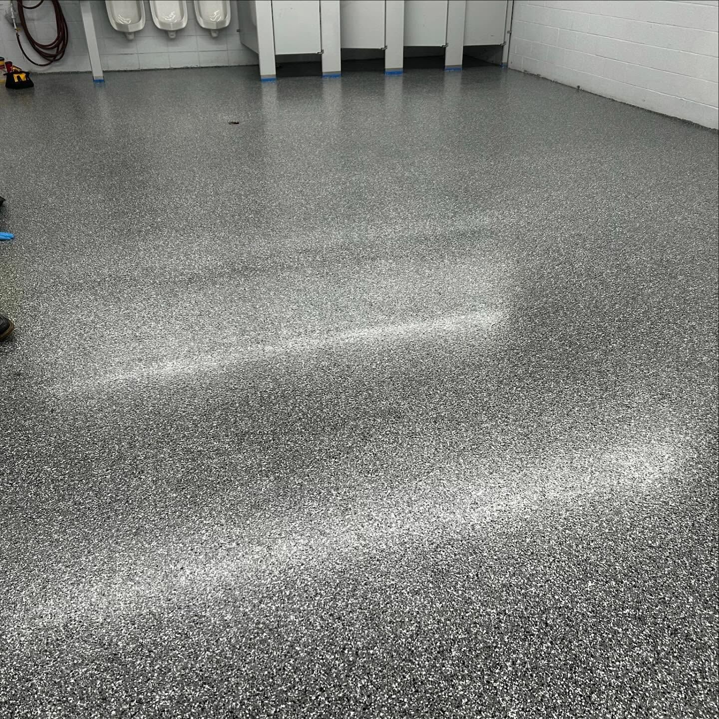 Epoxy flake flooring used in bathrooms and shop spaces by 814 Epoxy and More