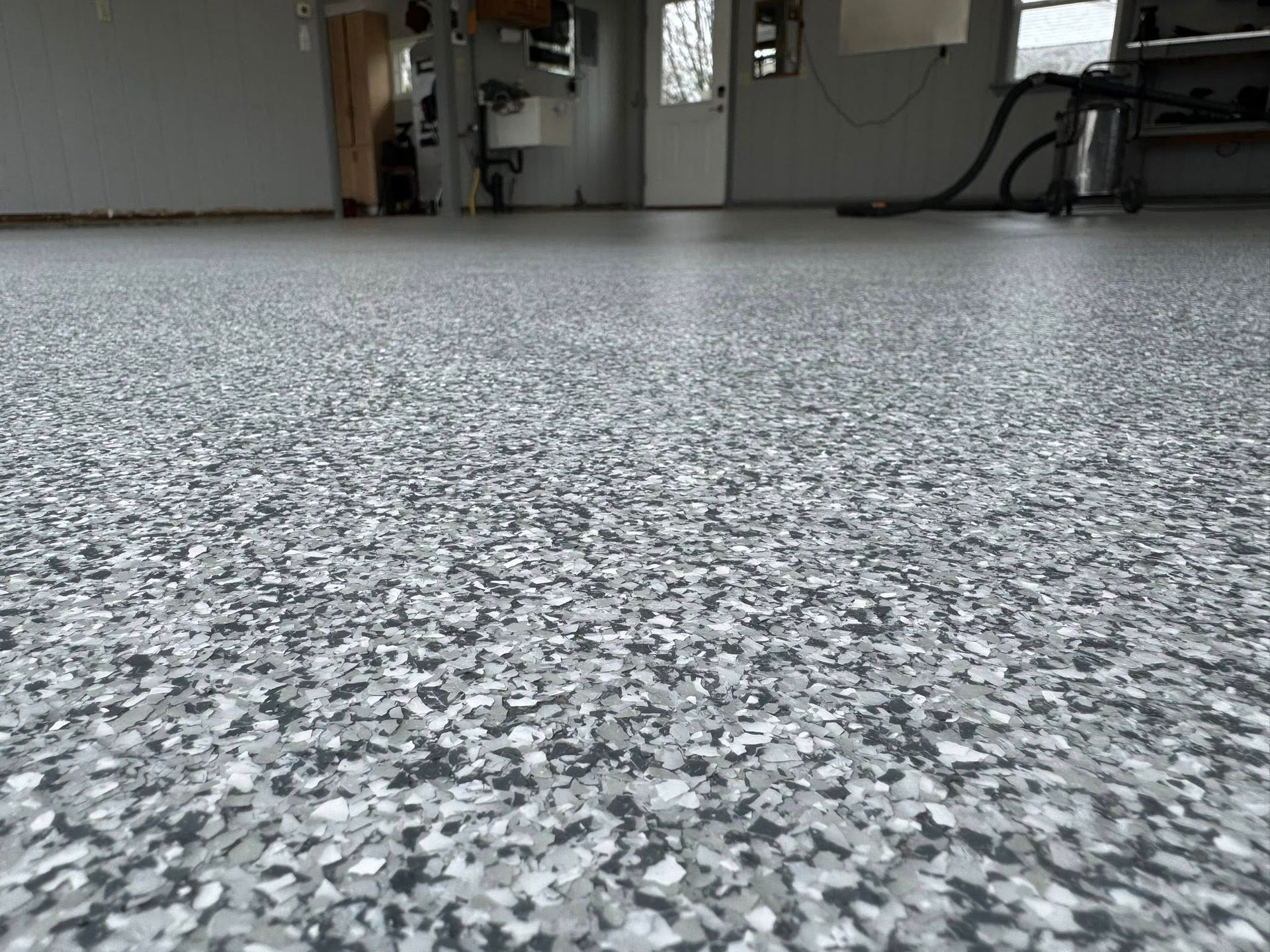 Gravel color blend epoxy flake floor texture Erie PA 814 Epoxy and More