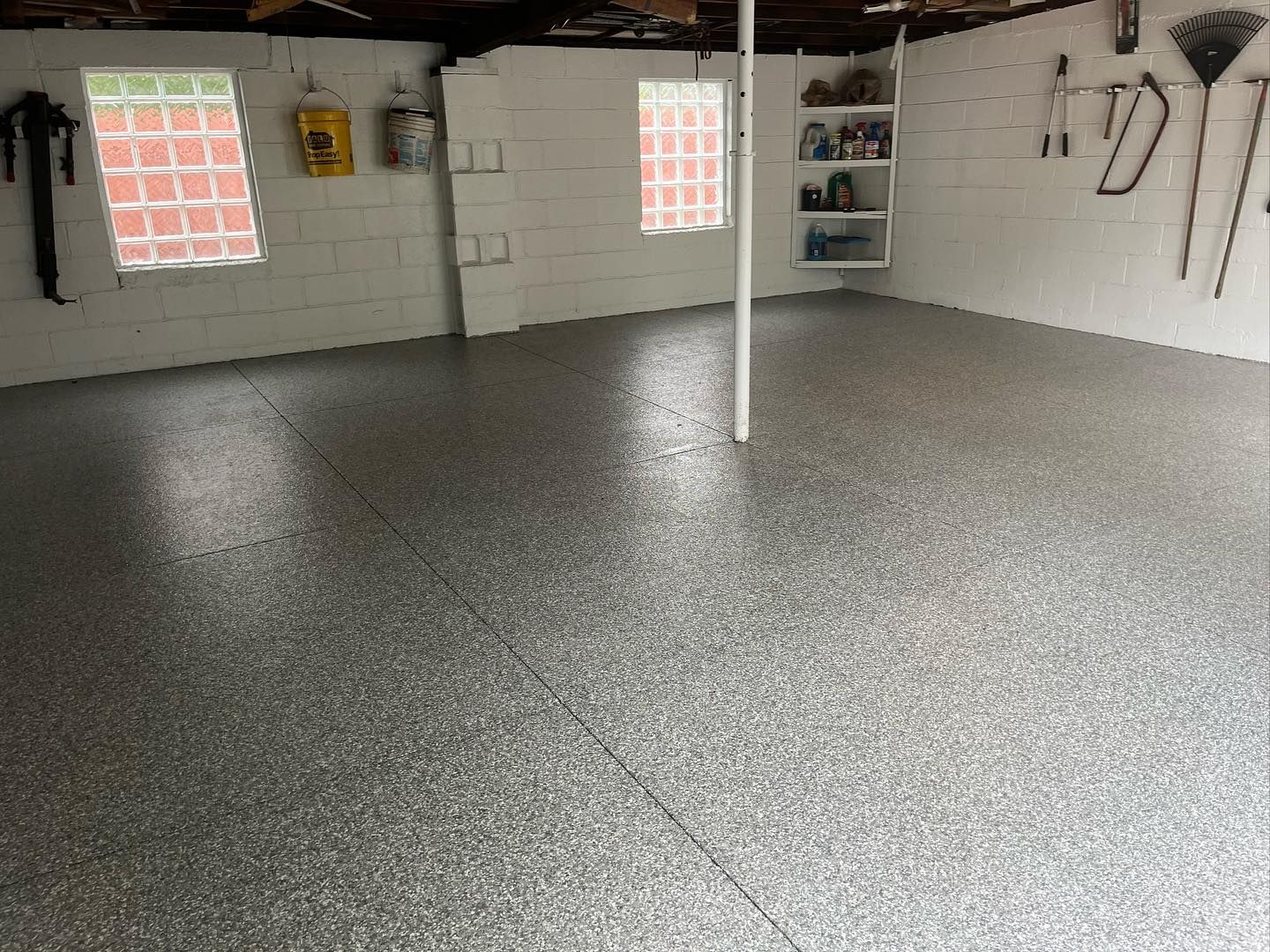 Gravel flake epoxy floor by 814 Epoxy and More in Erie, PA