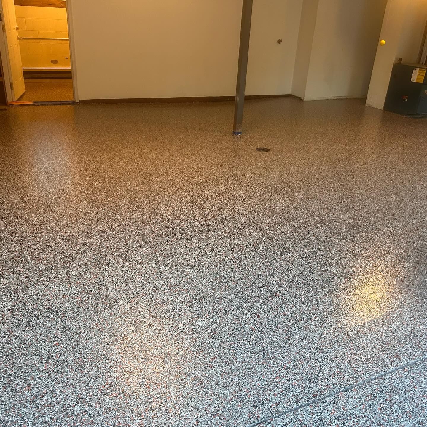Hog flake floor color by 814 Epoxy and More in Erie, PA