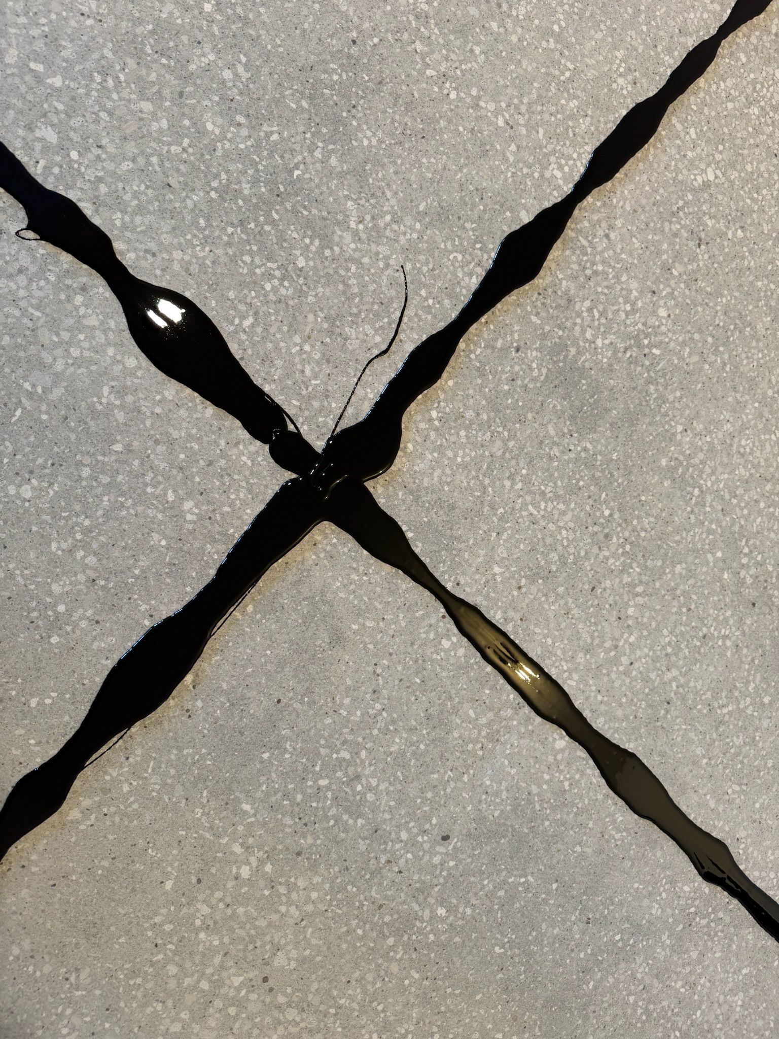Polyurea-filled control joints in a polished concrete floor in Erie, PA