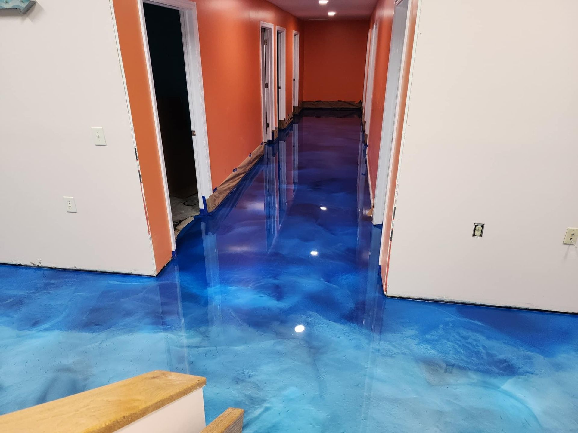 Decorative metallic epoxy floor installation in Erie, PA