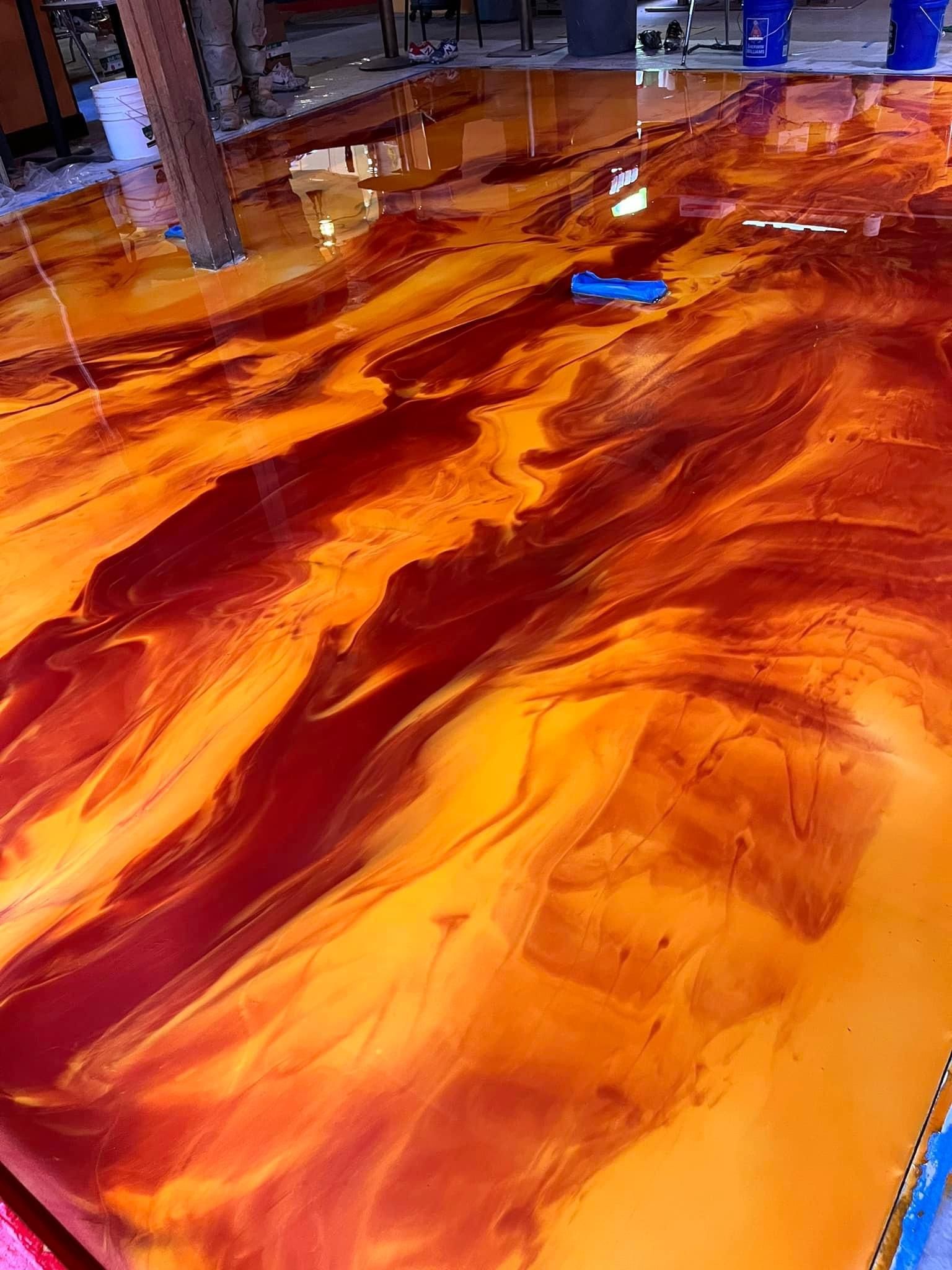 High-gloss metallic epoxy floor by 814 Epoxy and More
