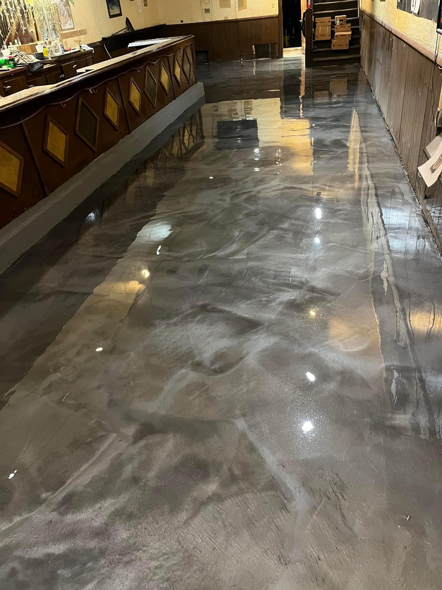 Metallic epoxy commercial bar floor installation Erie PA by 814 Epoxy