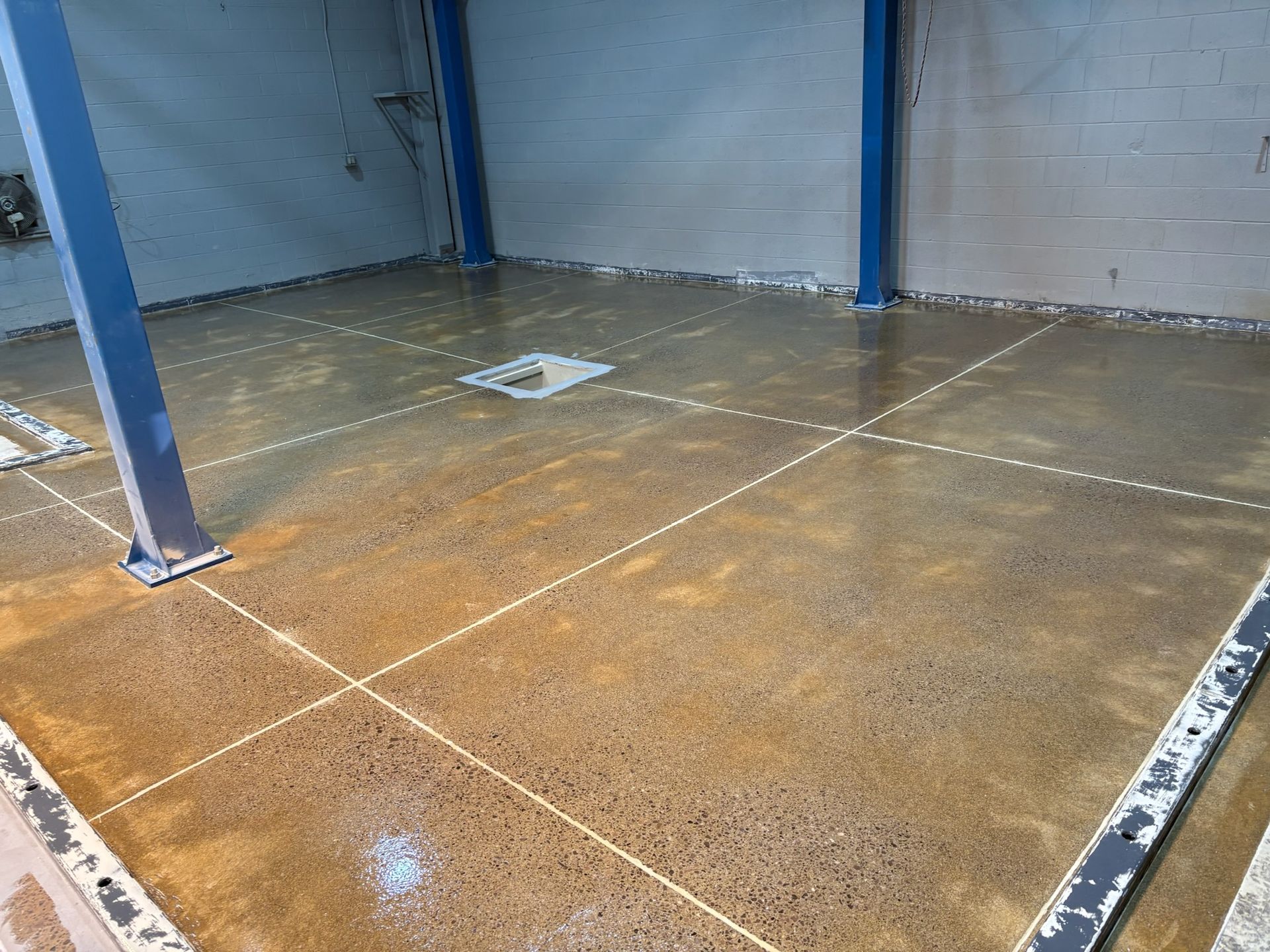 Chemical containment epoxy floor with drainage system Erie PA 814 Epoxy