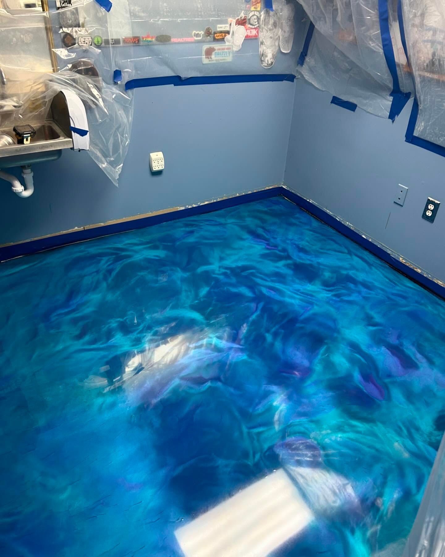 Metallic epoxy barbershop floor in a custom color by 814 Epoxy and More