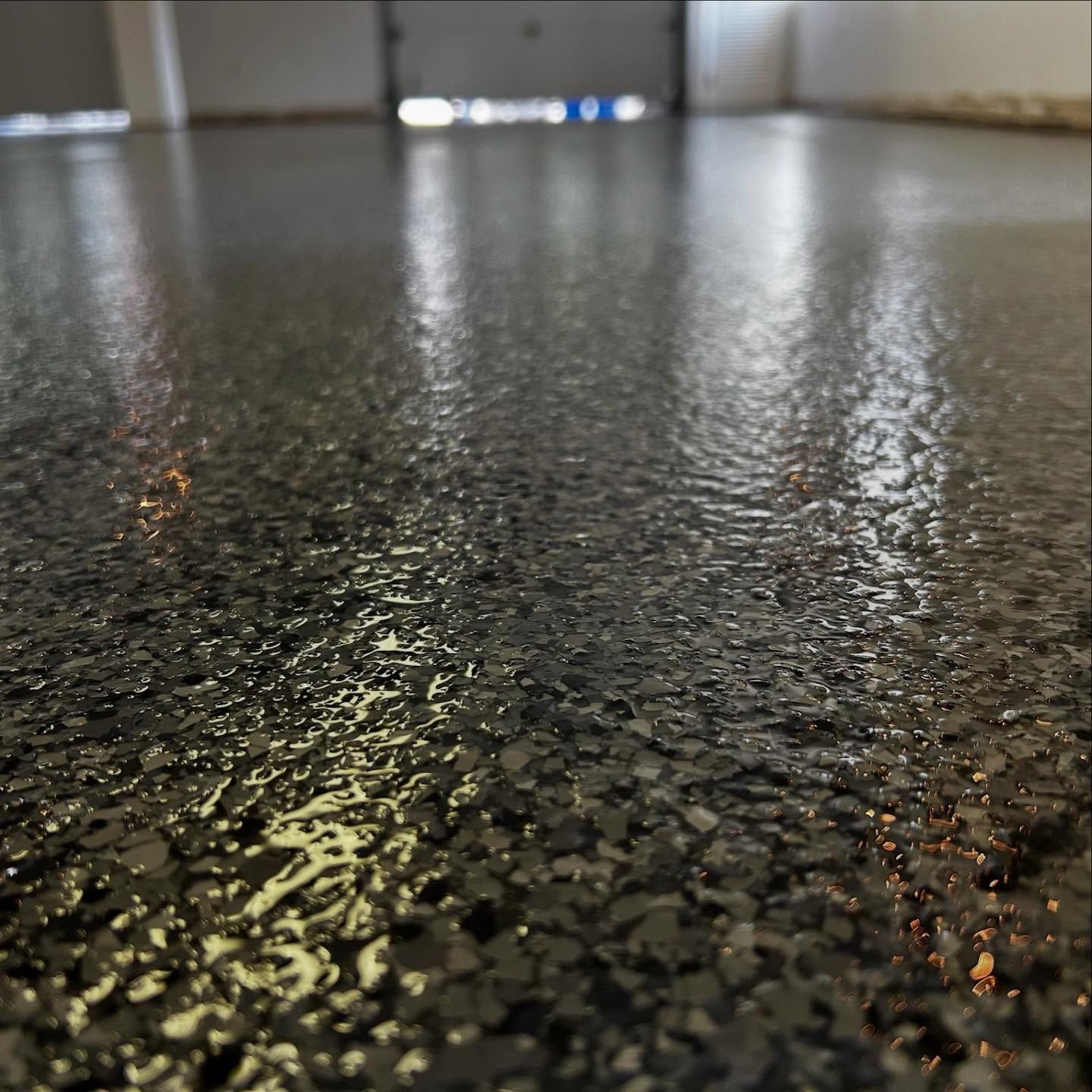 Nightfall flake epoxy floor by 814 Epoxy and More in Erie, PA