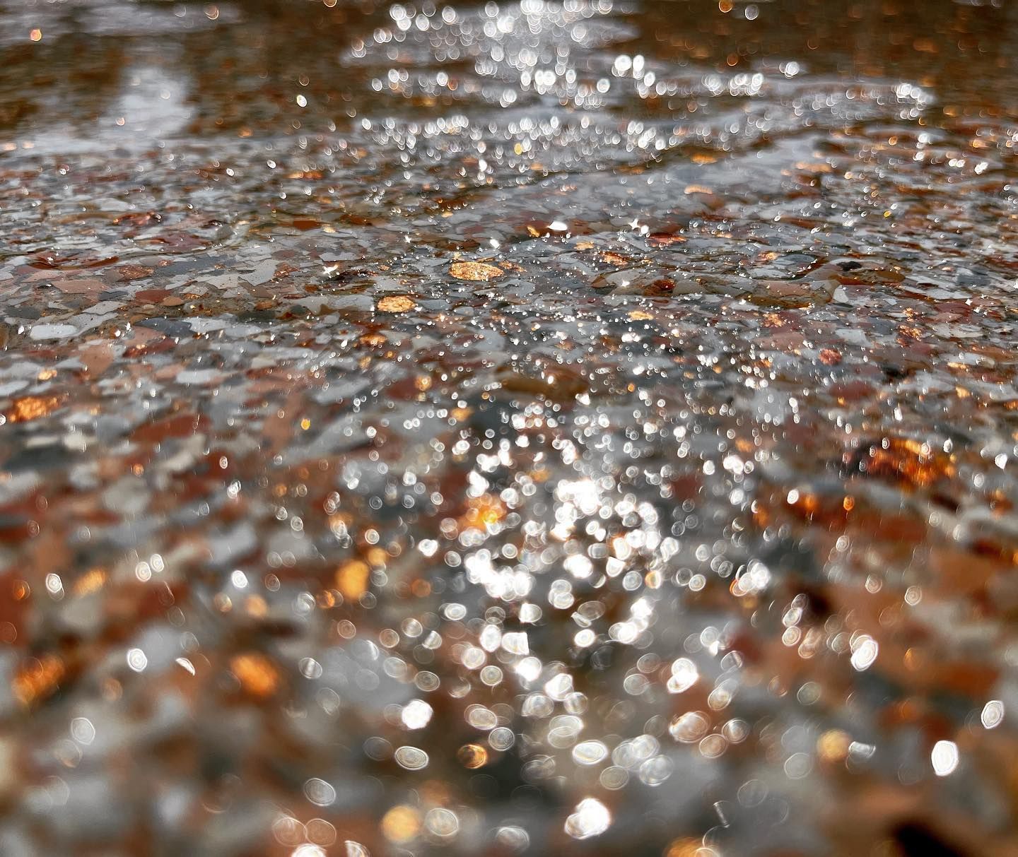Orange epoxy flake floor texture closeup Erie PA 814 Epoxy and More