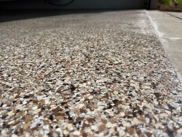 Outback epoxy flake garage floor with door and wall Erie PA 814 Epoxy