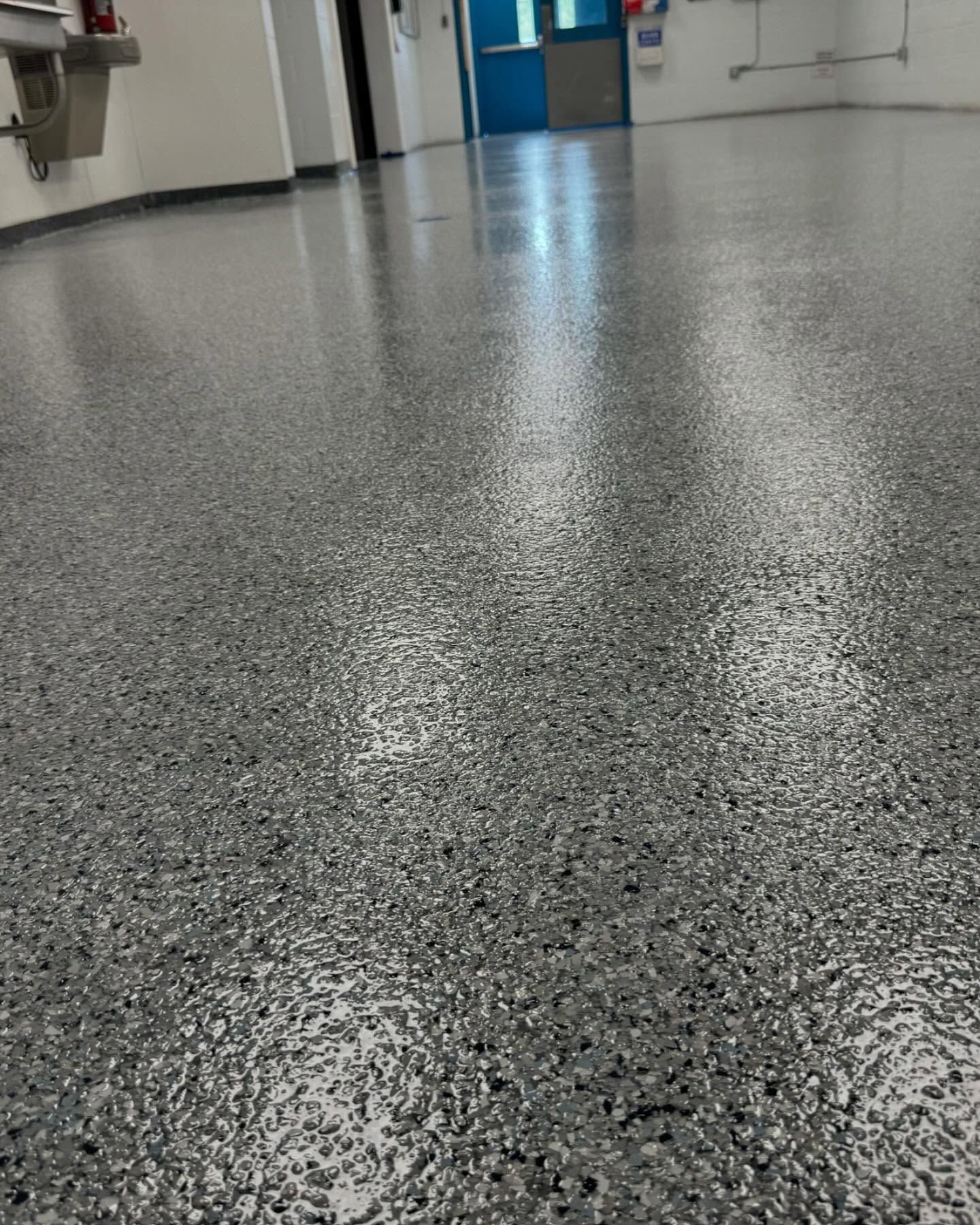 Rapids color epoxy flake floor in commercial hallway Erie PA 814 Epoxy