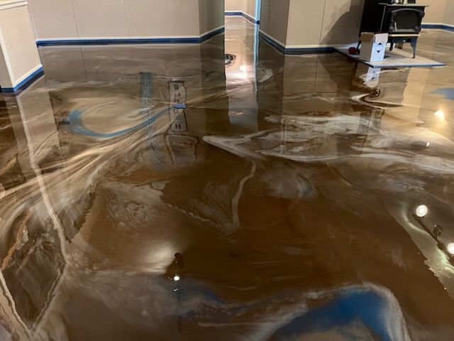 Metallic epoxy flooring project by 814 Epoxy and More in Erie, PA