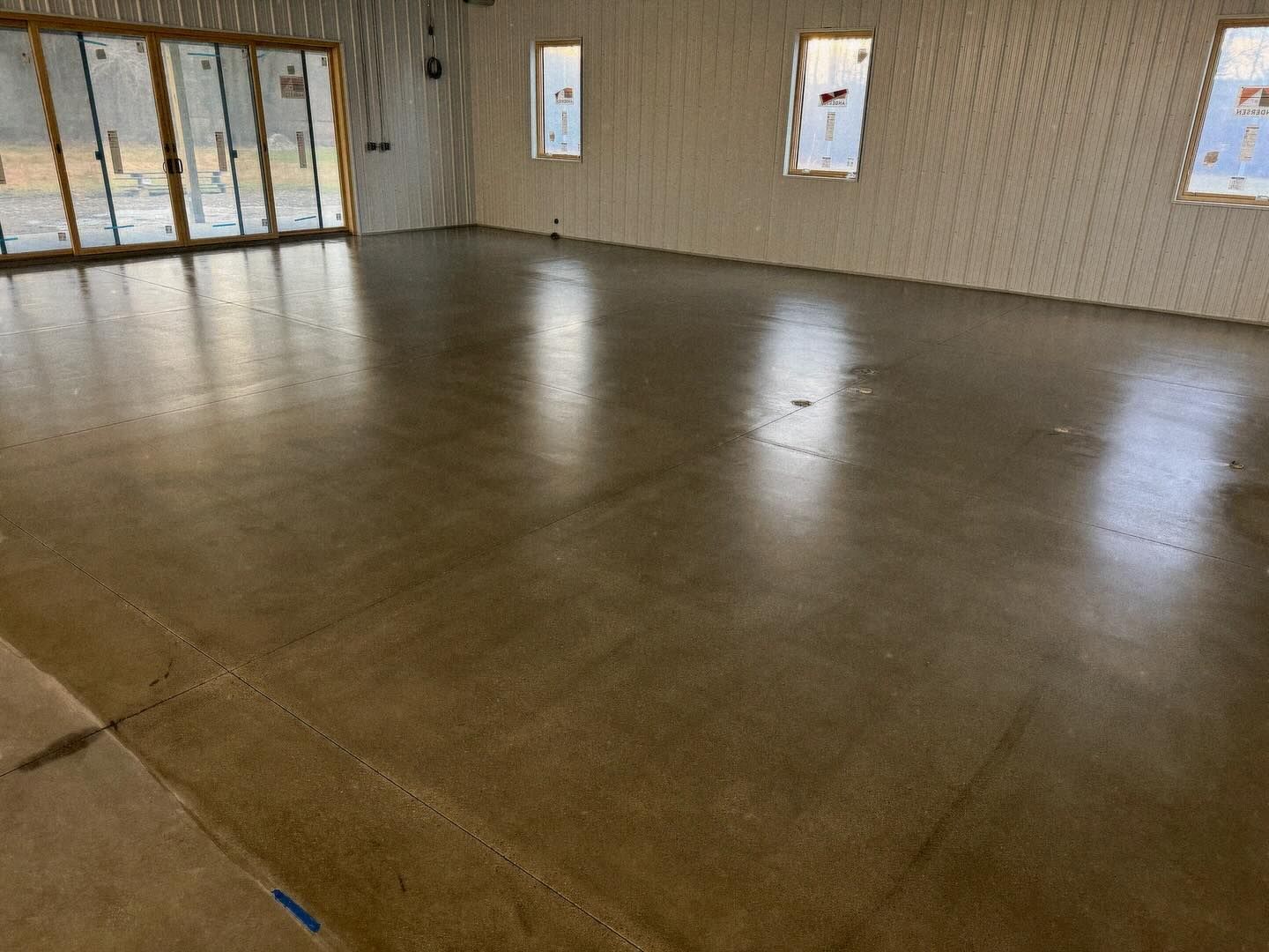 Grind and seal concrete floor with natural polished look in Erie, PA