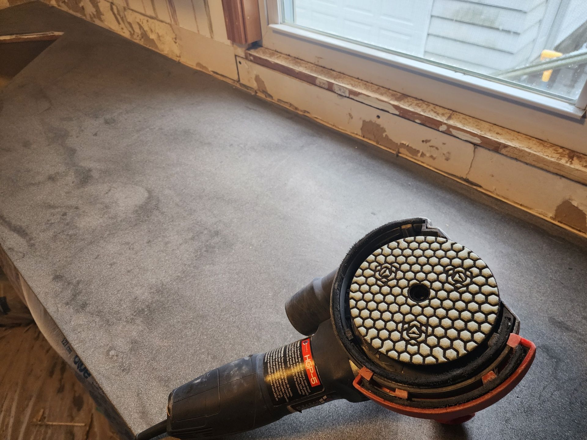 Concrete grinding and restoration prep work by 814 Epoxy Erie PA