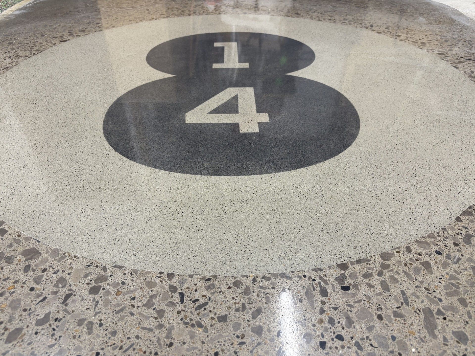 Custom logo embedded in an epoxy floor by 814 Epoxy and More