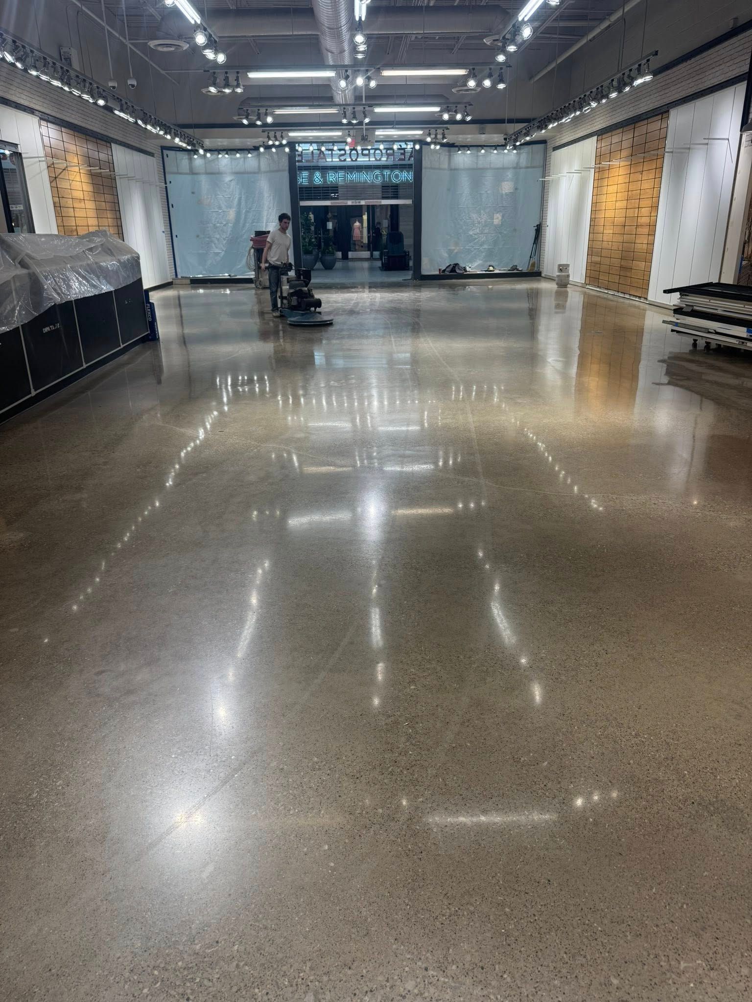 Johnny finishing an aero-aggregate polished concrete floor in Erie, PA