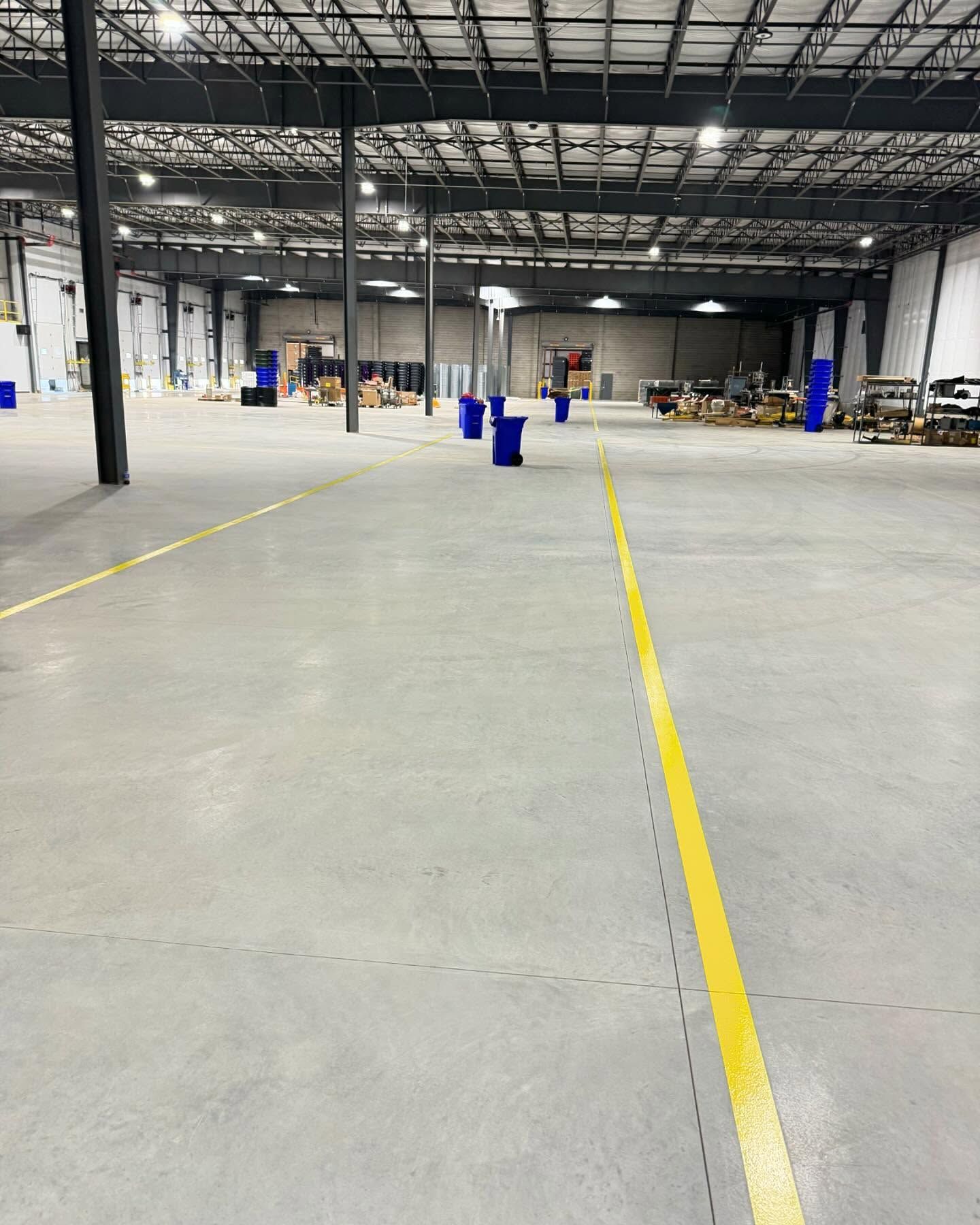 Industrial concrete floor prepared with shotblasting and line striping in Erie, PA