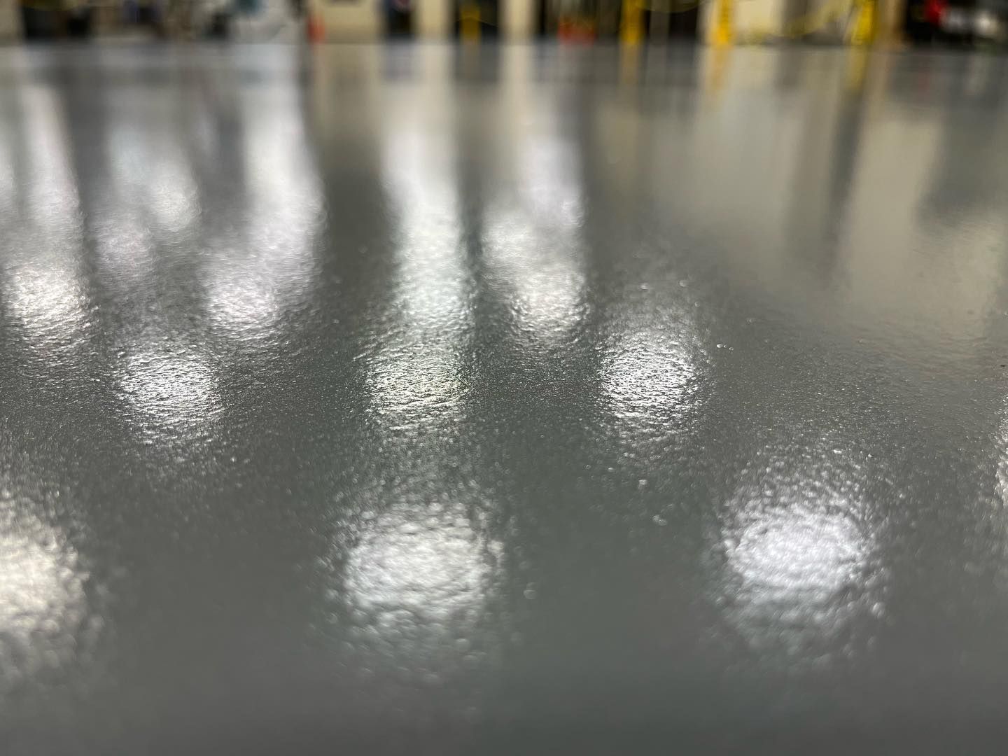 Close-up of a solid color STS shop floor coating in Erie, PA