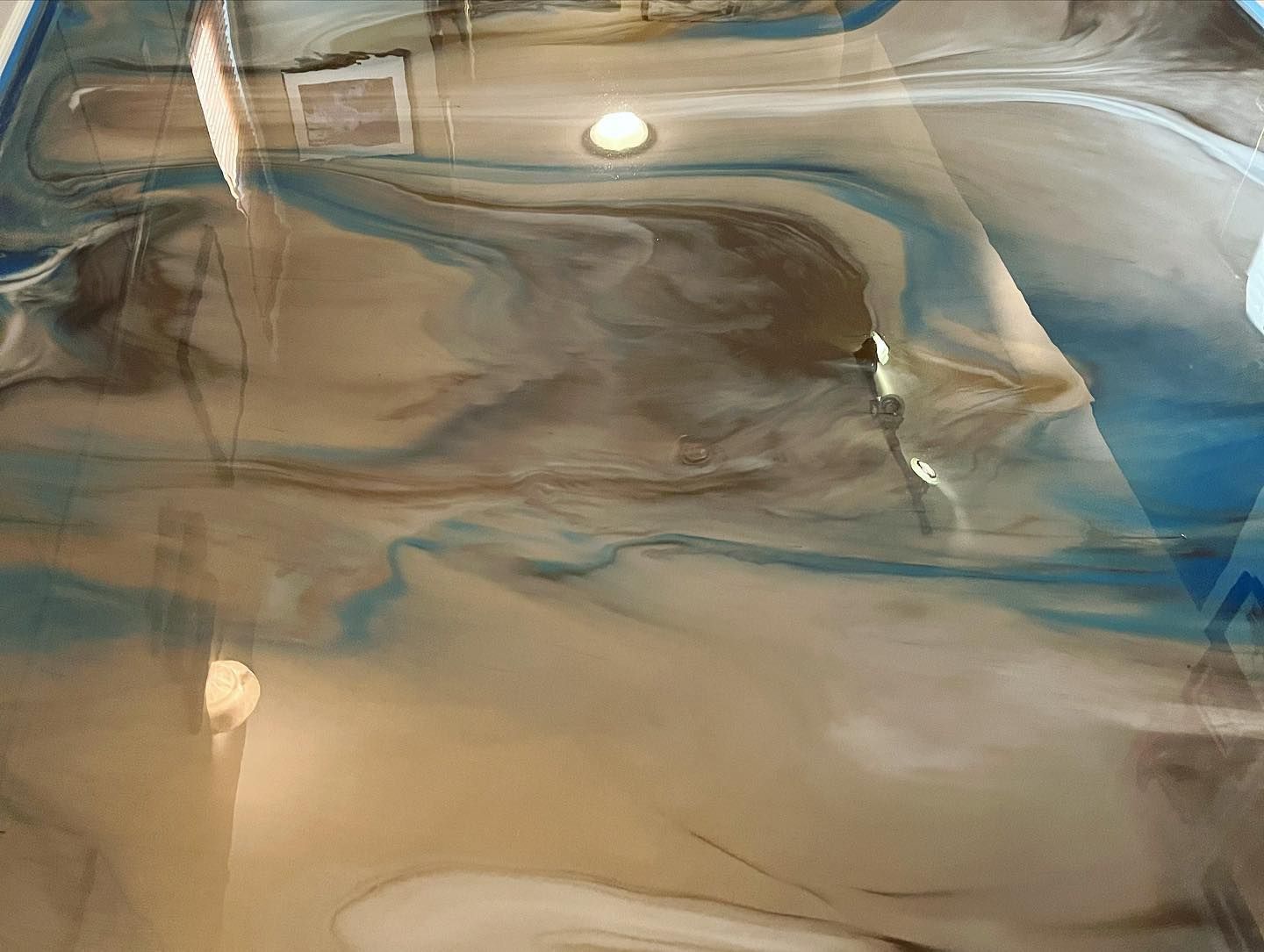 Blue and silver metallic epoxy floor custom swirl design Erie PA 814 Epoxy