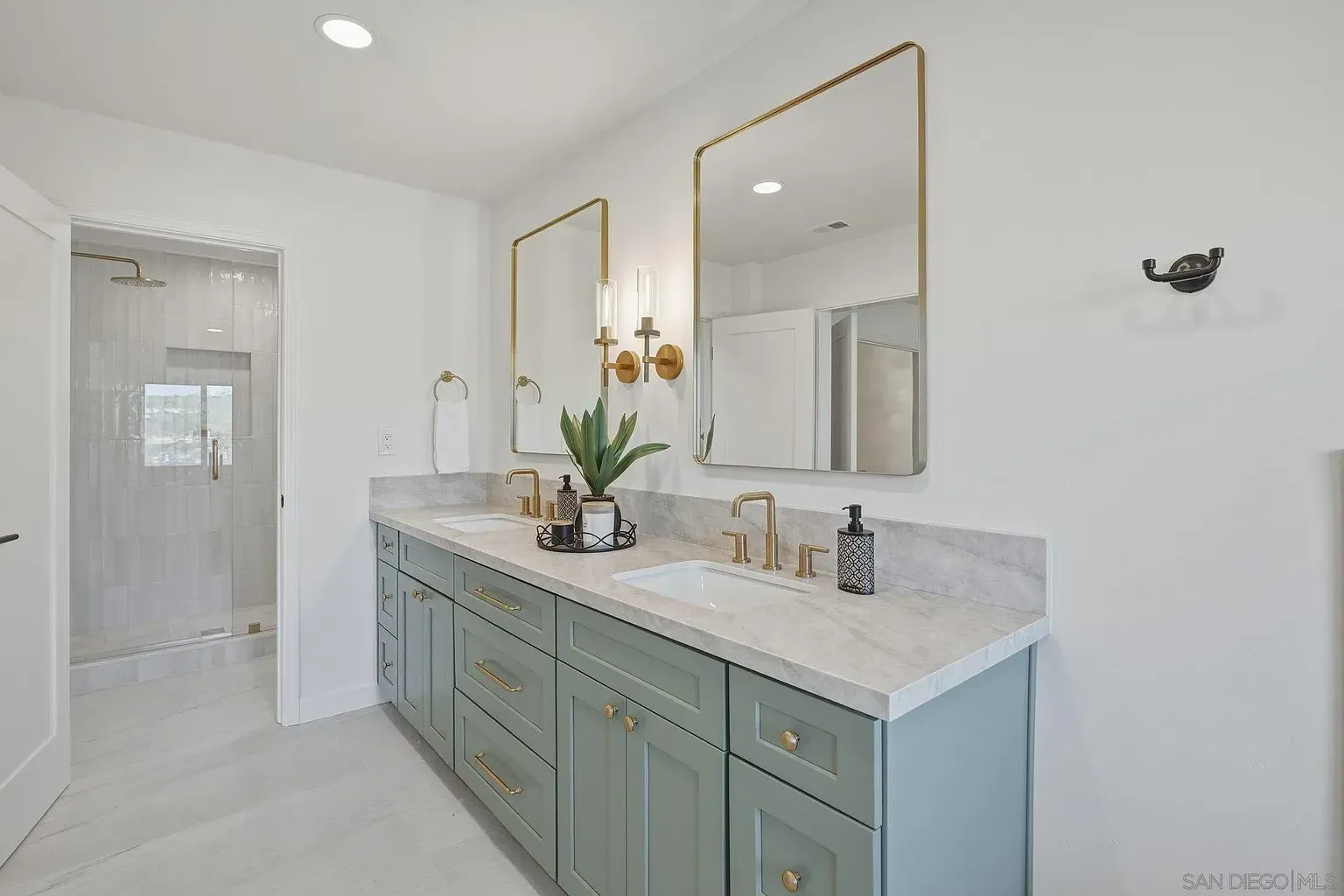2644 La Costa whole home remodel by Center Home Improvement - bathroom with green vanity