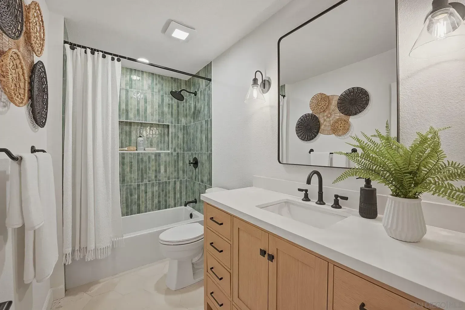 2644 La Costa whole home remodel by Center Home Improvement - bathroom with green tile