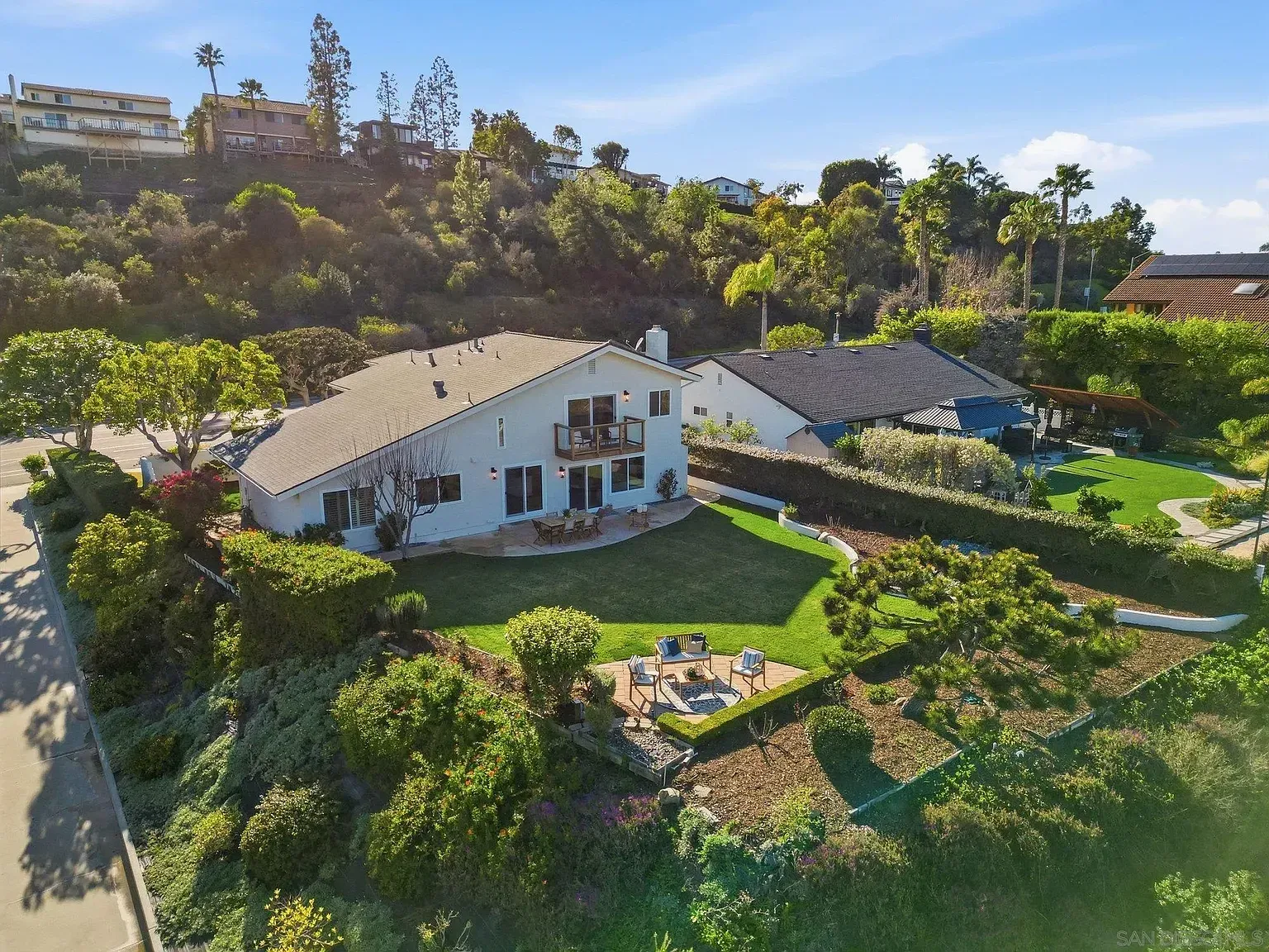 2644 La Costa whole home remodel by Center Home Improvement - exterior with backyard and pool